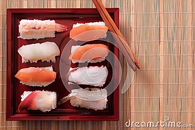 Tray assorted sushi chopsticks top view takeaway japanese food Stock Photo