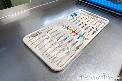 Tray contains the instruments for a finger joint prosthesis Stock Photo