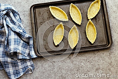 Tray with Empty Tartlets or pie Stock Photo