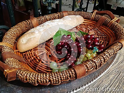 Loaf of bread with grapes. Stock Photo