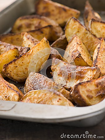 Tray of Spiced Potato Skins Stock Photo