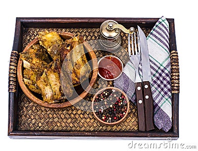 Tray, wooden bowl with spicy ribs, ketchup Stock Photo