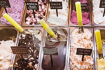 Trays of Italian ice cream made of milk, sugar and flavoring ingredient. Stock Photo