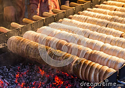 Trdelnik bakery on the street market in Prague, Czech Republic. Czech sweetness. Stock Photo