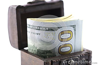 Treasure chest,the box of money,coins and dollars Stock Photo