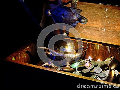 Treasure chest with magic lamp Stock Photo