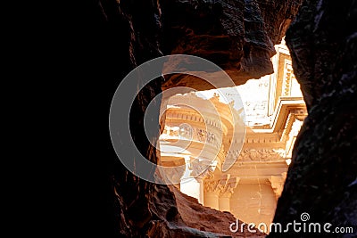 The treasure house of Petra from a perspective between the rocks in Wadi Musa, Petra, Jordan Stock Photo