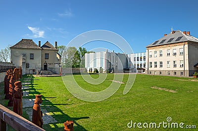 The Treasure House Skarbczyk and a school, next to the building of the royal castle, Szydlow, Poland Editorial Stock Photo
