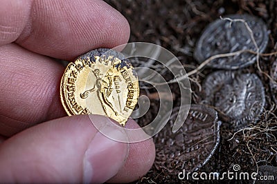 A treasure of Roman gold and silver coins.Trajan Decius. AD 249-251. AV Aureus.Ancient coin of the Roman Empire.Authentic silver Stock Photo