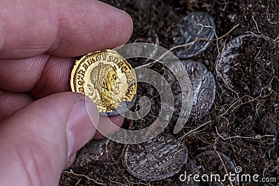 A treasure of Roman gold and silver coins.Trajan Decius. AD 249-251. AV Aureus.Ancient coin of the Roman Empire.Authentic silver Stock Photo