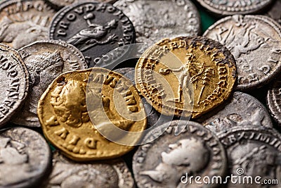 A treasure of Roman gold and silver coins.Trajan Decius. AD 249-251. AV Aureus.Ancient coin of the Roman Empire.Authentic silver Stock Photo