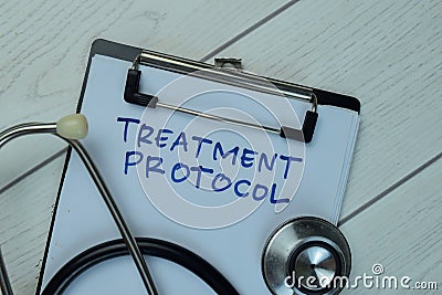 Treatment Protocol write on a paperwork isolated on Wooden Table Stock Photo
