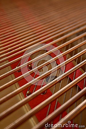 Piano treble and bass strings Stock Photo