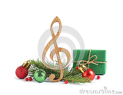 Treble clef with decorations isolated on . Christmas music concept Stock Photo