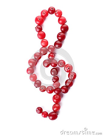 Treble clef made of cranberries on white background. Musical notes Stock Photo