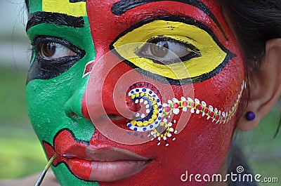 Treditional Indian painting designs on Face Editorial Stock Photo