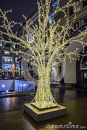 A tree in the form of a Christmas and New Year light installation. Moscow, Russia. Editorial Stock Photo