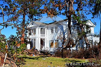 Tree leaning against home due to Hurricane Michael Editorial Stock Photo