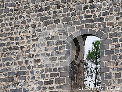 Tree looks from the window of the city walls in diyarbakir Stock Photo