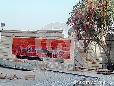 Tree by a Sadaam era building on a camp in Baghdad, Iraq Editorial Stock Photo