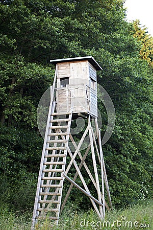 Tree stand, deer stand for hunters in forest Stock Photo