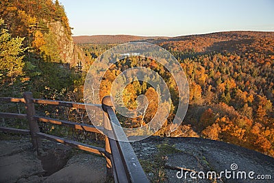 Trees in fall color, hills and lake viewed from a scenic overloo Stock Photo