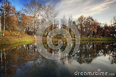 Trees shore of the pond autum Stock Photo