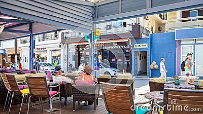 Treet with bars and open air cafes at seafront Editorial Stock Photo