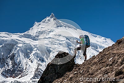 Trekker in front of Manaslu glacier on Manaslu circuit trek in N Stock Photo