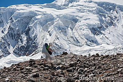 Trekker in front of Manaslu glacier on Manaslu circuit trek in N Stock Photo