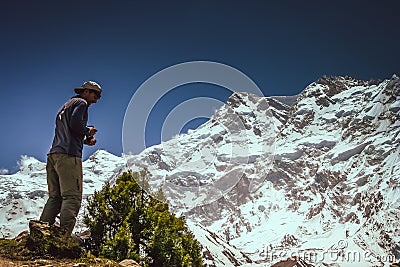 Trekker In front of Nanga Parbat Stock Photo