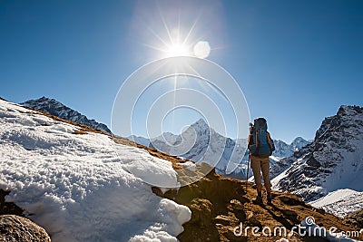 Trekker in Khumbu valley in front of Abadablan mount on a way to Stock Photo