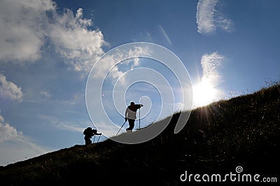 Trekking silhouettes Stock Photo