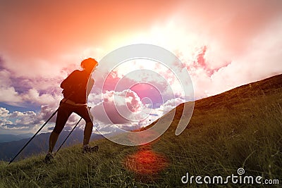 Trekking in silhouettes Stock Photo