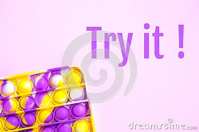 Trend bright multicolored antistress toy Pop it Stock Photo