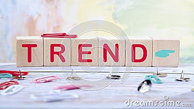 Trend text written on wooden cubes on a light colored background Business, trend or megatrend concept Stock Photo