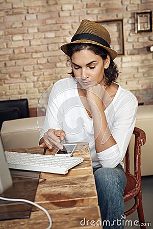 Trendy adult woman working at home Stock Photo
