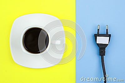 Trendy flat lay minimal concept, unplugged cord and cup of coffee n bright background, concept of a break, rest from modern techn Stock Photo