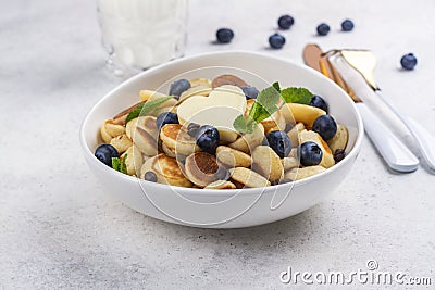 Trendy food - mini pancake cereal Stock Photo