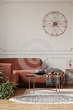 Trendy living room interior with brown corner sofa Stock Photo