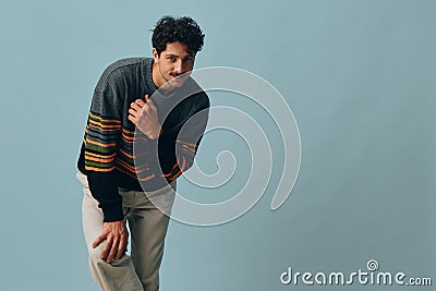 Trendy man handsome hipster studio copyspace smile fashion portrait sweater face style male Stock Photo