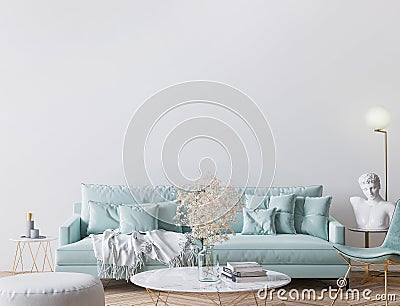 Trendy modern living room in light turquoise color and golden home accessories Stock Photo