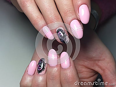 Trendy manicure with bright feather design Stock Photo