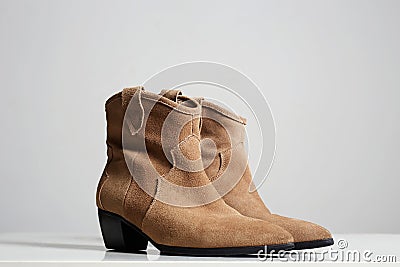 Trendy suede boots. fashion female shoes Stock Photo