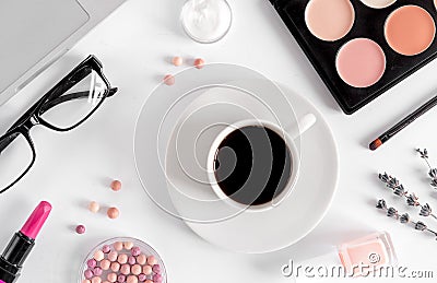 Trendy woman desk with cosmetic, lavender, coffee white background top view Stock Photo