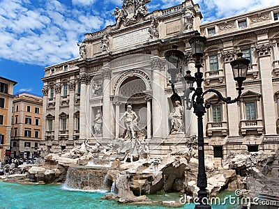 Trevi Fountain in Rome against the cloudy sky - Italy. (Fontana di Trevi) Stock Photo