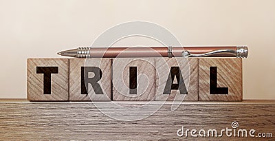 Trial Word In Wooden Cubes. Free version to attract more clients business concept Stock Photo