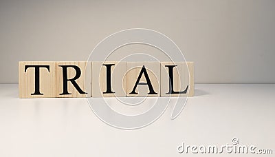 Trial word from wooden cubes. About legal terms Stock Photo