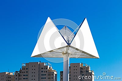 Triangle billboard or advertising poster with city and blue sky background Stock Photo