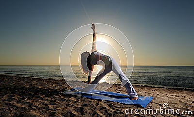 Triangle Pose (Trikonasana) Yoga Stock Photo